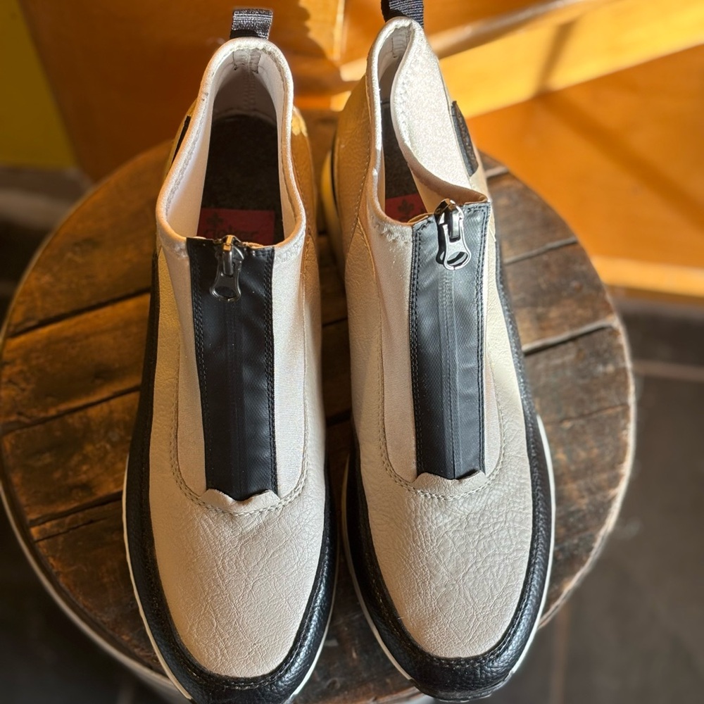 Rieker Black and White Ankle Boots with Sleek Design